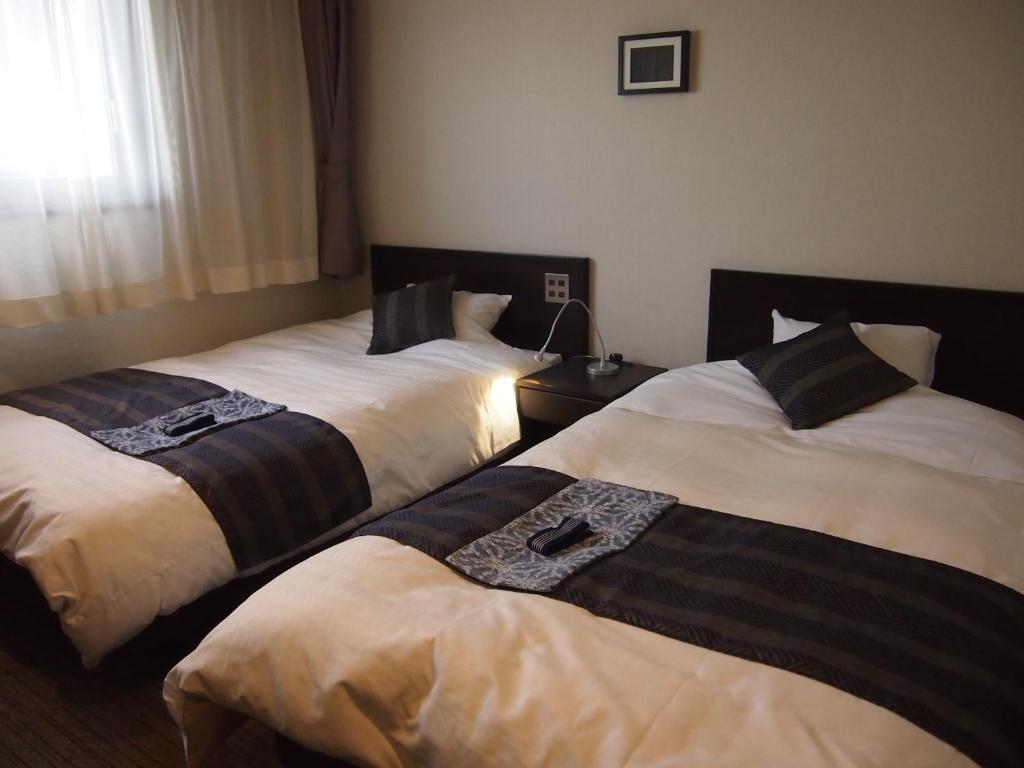 Silk Inn Кагосима Номер фото